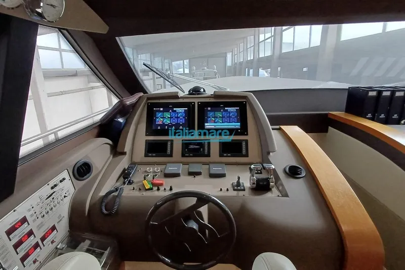  Yacht Photos Pics 2008 Ferretti Yachts 592 helm with advanced navigation displays and controls.