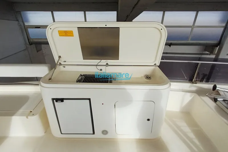  Yacht Photos Pics Outdoor grill on 2008 Ferretti Yachts 592, featuring a sleek white design.