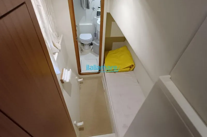  Yacht Photos Pics Compact cabin with bed and bathroom in 2008 Ferretti Yachts 592.