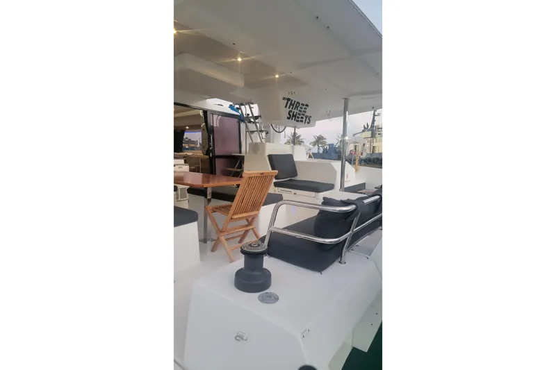 Three Sheets Yacht Photos Pics 2019 Fountaine Pajot Saona 47 yacht interior with seating and table.