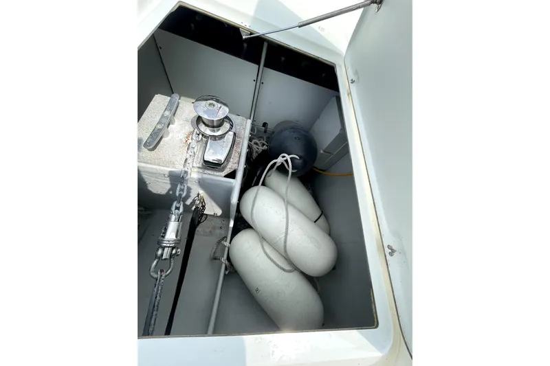 Three Sheets Yacht Photos Pics Anchor locker of 2019 Fountaine Pajot Saona 47 with fenders and chain.