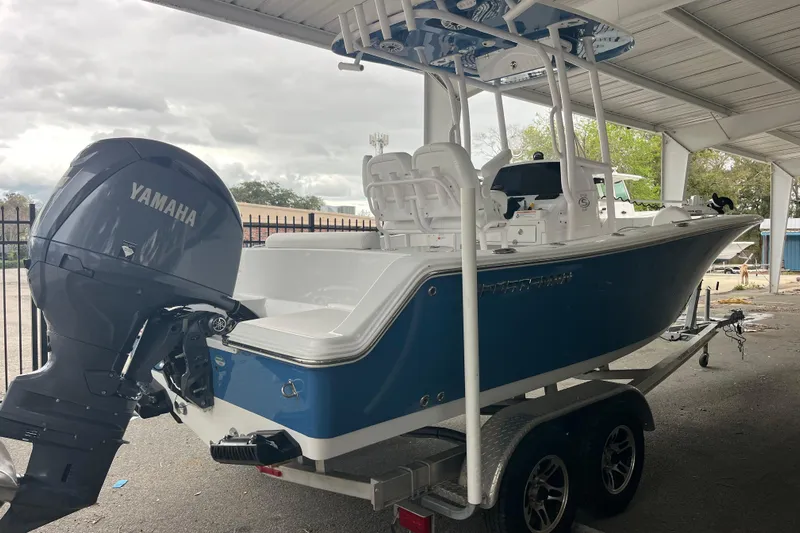  Yacht Photos Pics 2024 Sportsman Open 212 Center Console boat with Yamaha engine on trailer.