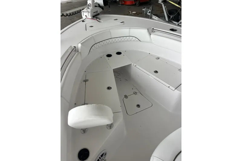  Yacht Photos Pics 2024 Sportsman Open 212 Center Console boat interior with seating and storage compartments.