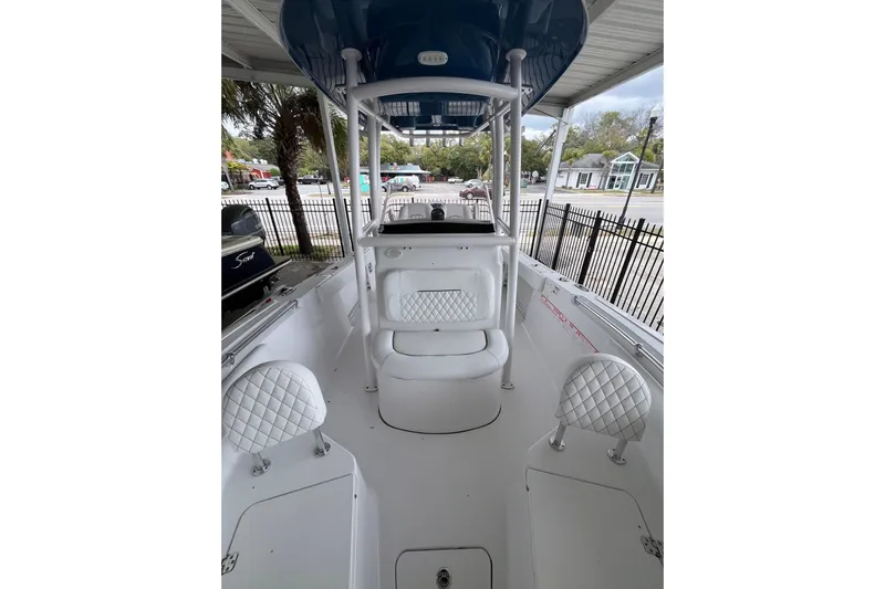  Yacht Photos Pics 2024 Sportsman Open 212 Center Console boat interior with white seating and console.
