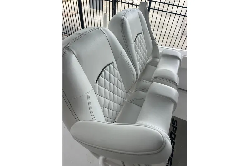  Yacht Photos Pics 2024 Sportsman Open 212 Center Console boat seats with quilted design and armrests.
