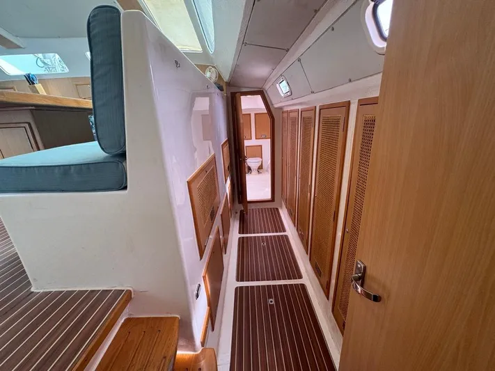 Avatar Yacht Photos Pics Interior of 2010 Admiral 38 Executive yacht with wooden flooring and cabinetry.