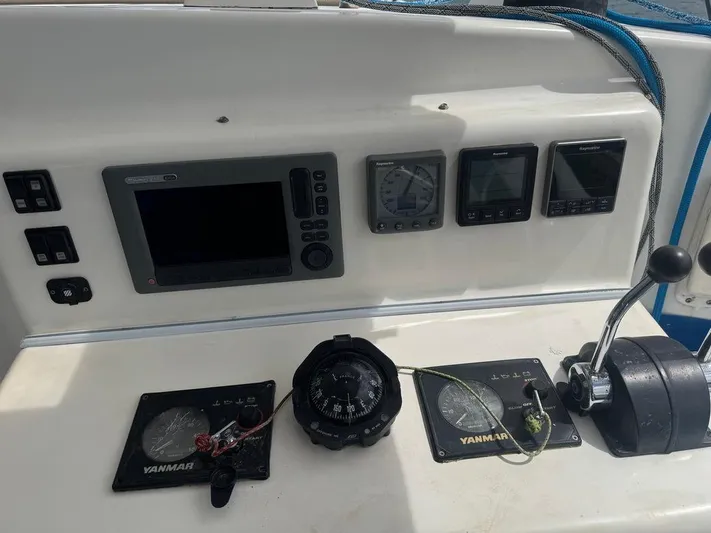 Avatar Yacht Photos Pics Control panel of a 2010 Admiral 38 Executive yacht with navigation instruments.