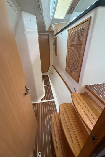 Avatar Yacht Photos Pics Interior of 2010 Admiral 38 Executive yacht with wooden flooring and steps.