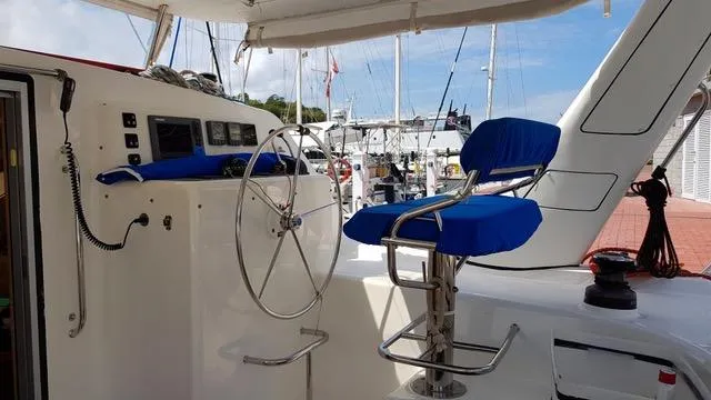 Avatar Yacht Photos Pics Cockpit of 2010 Admiral 38 Executive yacht with blue seating and steering wheel.