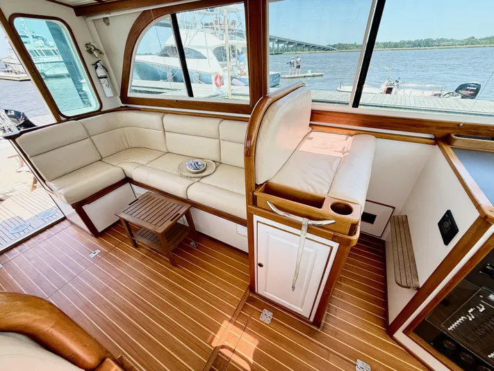 Yacht Photos Pics Luxurious interior of 2006 Mast & Mallet Thomas Point 40 yacht with leather seating and wood finish.