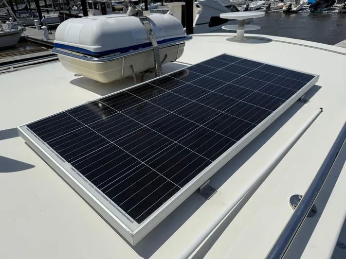  Yacht Photos Pics Solar panel on 2006 Mast & Mallet Thomas Point 40 boat deck, docked at marina.