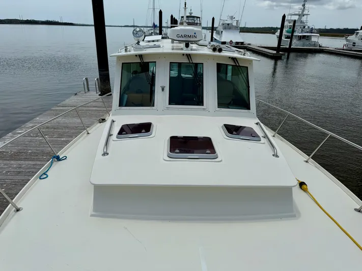 Yacht Photos Pics 2006 Mast & Mallet Thomas Point 40 boat docked at marina, front view.