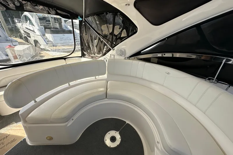 Beyond The Reef Yacht Photos Pics Luxurious interior of 2008 Regal Commodore 4060 yacht with curved seating.