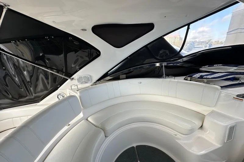 Beyond The Reef Yacht Photos Pics Luxurious interior of 2008 Regal Commodore 4060 yacht with white seating and sleek design.