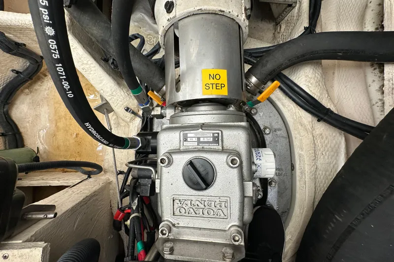 Beyond The Reef Yacht Photos Pics Engine compartment of 2008 Regal Commodore 4060 with Volvo Penta components.