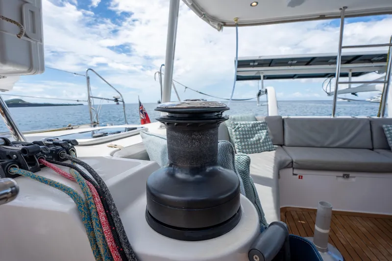 Inky Blue Yacht Photos Pics Outremer 51 sailboat deck, featuring winch and seating, 2020 model, ocean view.