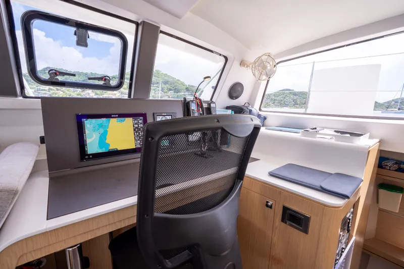 Inky Blue Yacht Photos Pics 2020 Outremer 51 yacht interior with navigation station and modern equipment.