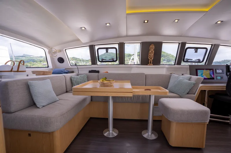 Inky Blue Yacht Photos Pics Interior of 2020 Outremer 51 catamaran with modern seating and decor.