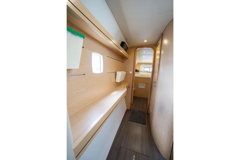 Inky Blue Yacht Photos Pics Interior of 2020 Outremer 51 catamaran, featuring sleek wooden design and modern amenities.