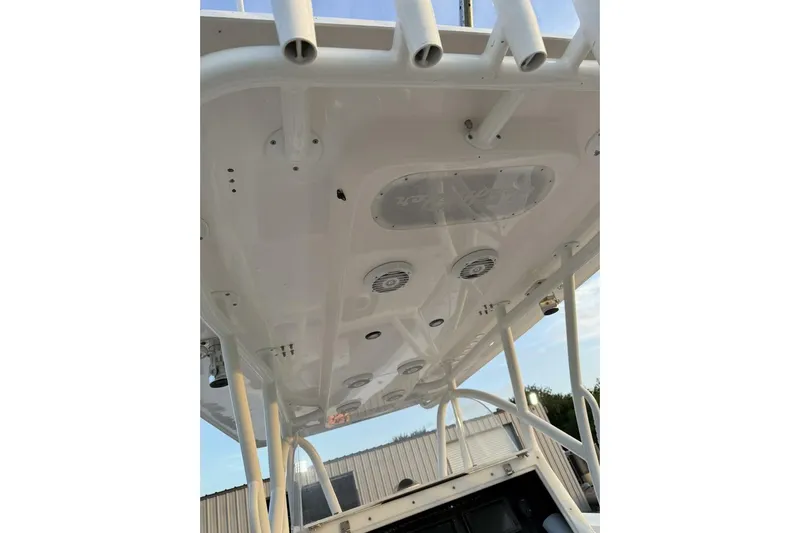 Pass It On Yacht Photos Pics 2014 SeaHunter 40 Tournament boat's overhead view with rod holders and speakers.
