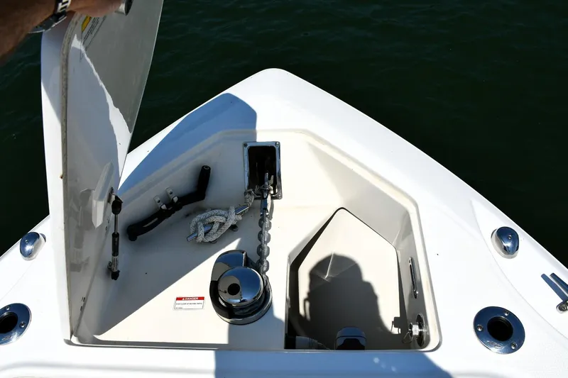  Yacht Photos Pics Open anchor locker on 2016 Boston Whaler 280 Outrage boat, showing chain and rope.
