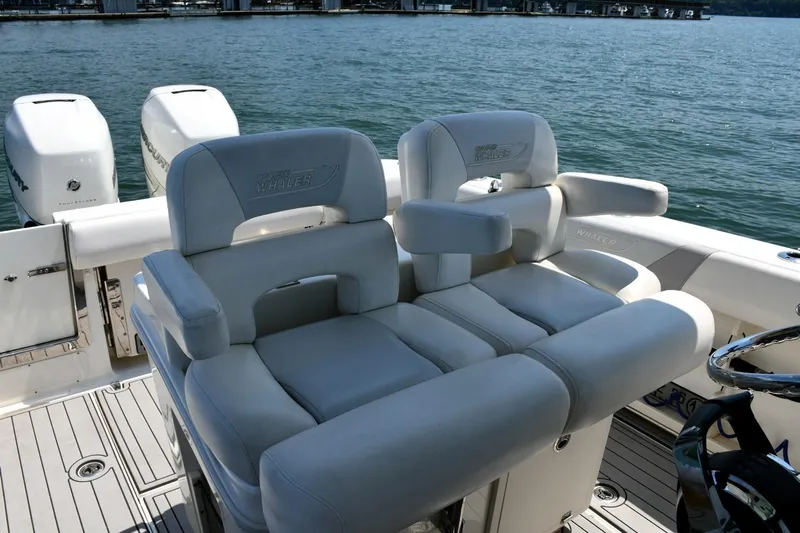  Yacht Photos Pics 2016 Boston Whaler 280 Outrage boat interior with luxurious seating and dual engines.