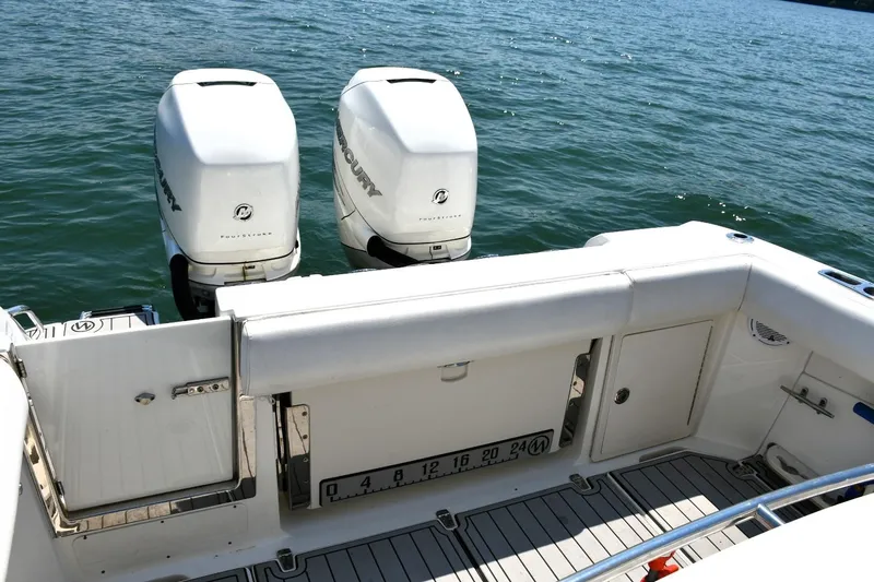  Yacht Photos Pics 2016 Boston Whaler 280 Outrage boat with twin Mercury engines on the water.