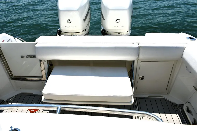  Yacht Photos Pics 2016 Boston Whaler 280 Outrage boat with dual engines and cushioned seating.