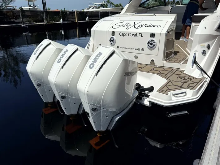 Salty Xperience Yacht Photos Pics 2020 Sea Ray 320 Sundancer OB Coupe with triple Mercury outboard engines, docked in Cape Coral.