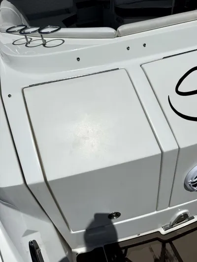 Salty Xperience Yacht Photos Pics 2020 Sea Ray 320 Sundancer OB Coupe boat deck with cup holders and seating.