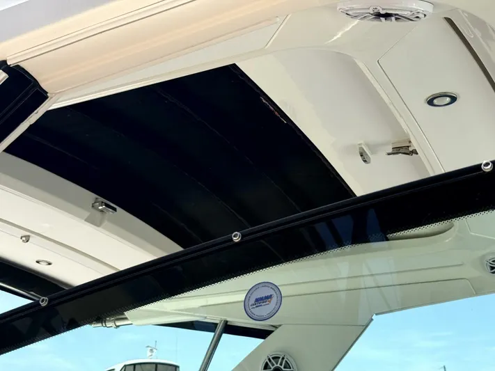 Salty Xperience Yacht Photos Pics 2020 Sea Ray 320 Sundancer OB Coupe interior roof and windshield detail.