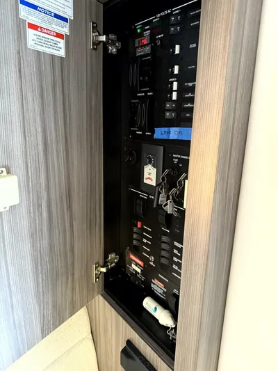 Salty Xperience Yacht Photos Pics Electrical panel inside a 2020 Sea Ray 320 Sundancer OB Coupe boat.