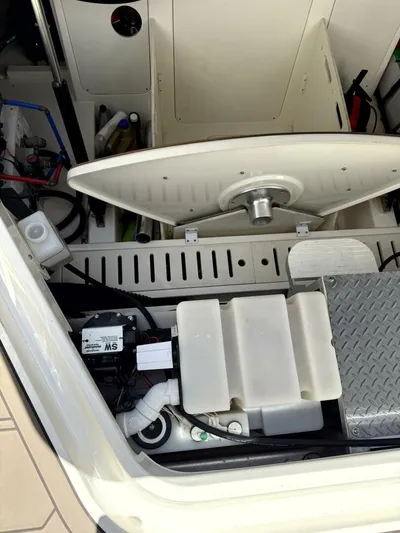 Salty Xperience Yacht Photos Pics Engine compartment of 2020 Sea Ray 320 Sundancer OB Coupe, showcasing mechanical components.