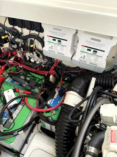 Salty Xperience Yacht Photos Pics Engine compartment of 2020 Sea Ray 320 Sundancer OB Coupe with ProNautic chargers.