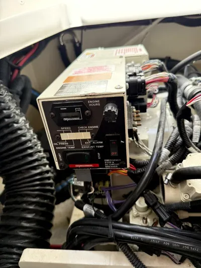 Salty Xperience Yacht Photos Pics Control panel of a 2020 Sea Ray 320 Sundancer OB Coupe engine compartment.