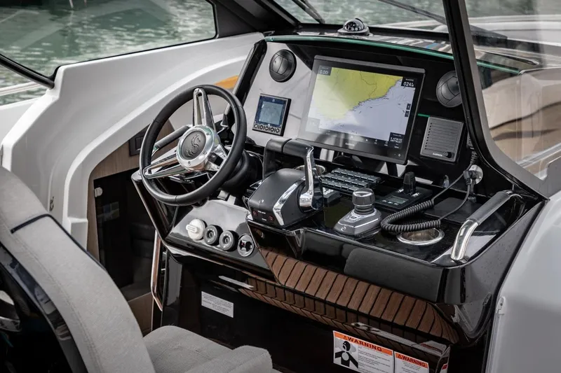  Yacht Photos Pics 2026 Beneteau Gran Turismo 35 helm with advanced navigation and control systems.