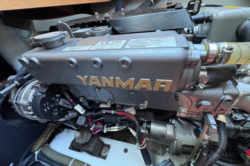  Yacht Photos Pics Yanmar engine in a 2016 Lagoon 450 F catamaran, showcasing detailed components.