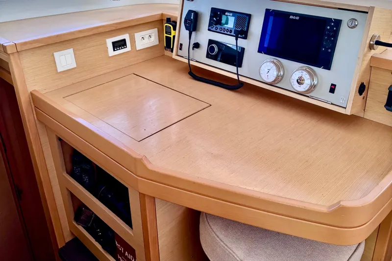  Yacht Photos Pics Navigation station on 2016 Lagoon 450 F catamaran with control panel and instruments.