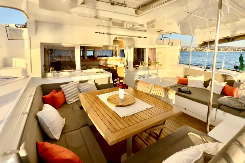  Yacht Photos Pics Luxurious 2016 Lagoon 450 F yacht interior with elegant seating and ocean view.