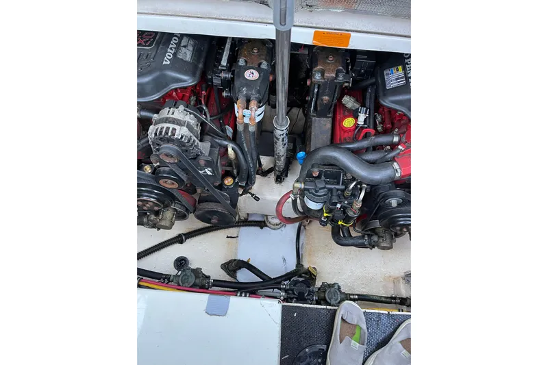 "magic Ten" Yacht Photos Pics Engine compartment of a 2015 Monterey 335 Sport Yacht, showcasing mechanical components.