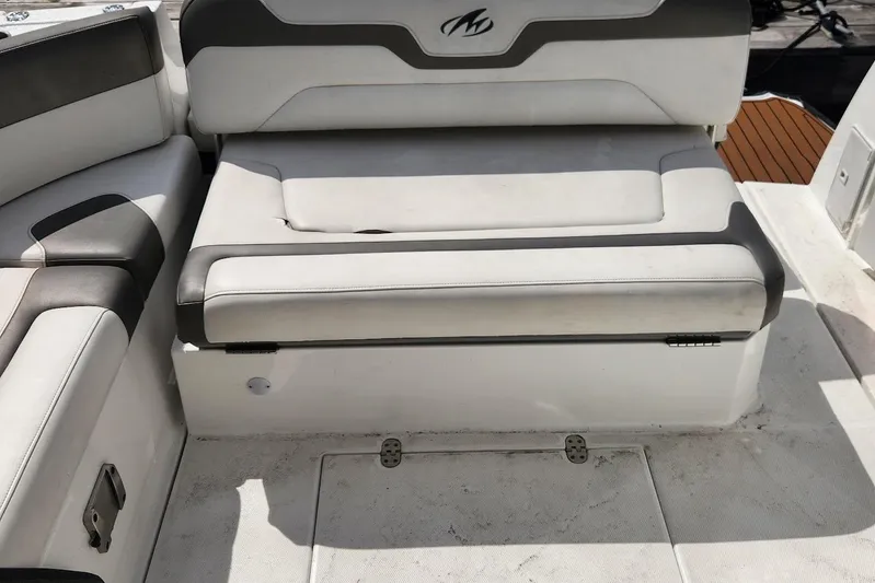 "magic Ten" Yacht Photos Pics 2015 Monterey 335 Sport Yacht interior seating with white and gray upholstery.