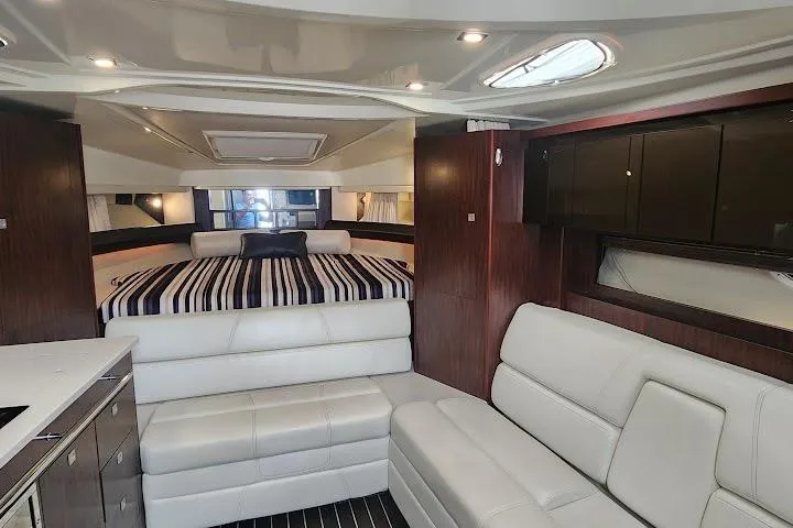 "magic Ten" Yacht Photos Pics Luxurious interior of 2015 Monterey 335 Sport Yacht with modern furnishings and elegant design.