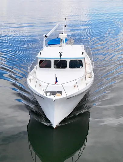 Harmony Yacht Photos Pics 1980 Custom TRI CABIN boat cruising on calm water.