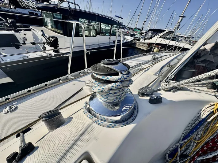  Yacht Photos Pics Deck of 1991 Beneteau 45 First yacht with winch and ropes in marina.