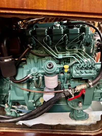  Yacht Photos Pics Engine of a 1991 Beneteau 45 First sailboat, showcasing intricate mechanical components.