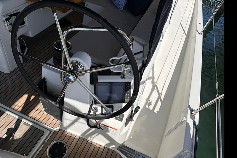 Nautical Dreamer Yacht Photos Pics Steering wheel and controls of 2019 Jeanneau Sun Odyssey 490 sailboat.