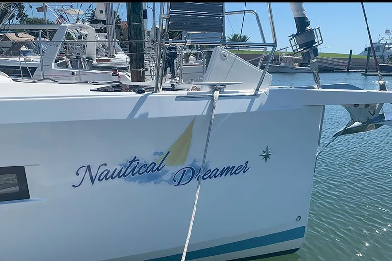 Nautical Dreamer Yacht Photos Pics 2019 Jeanneau Sun Odyssey 490 "Nautical Dreamer" docked in a marina.
