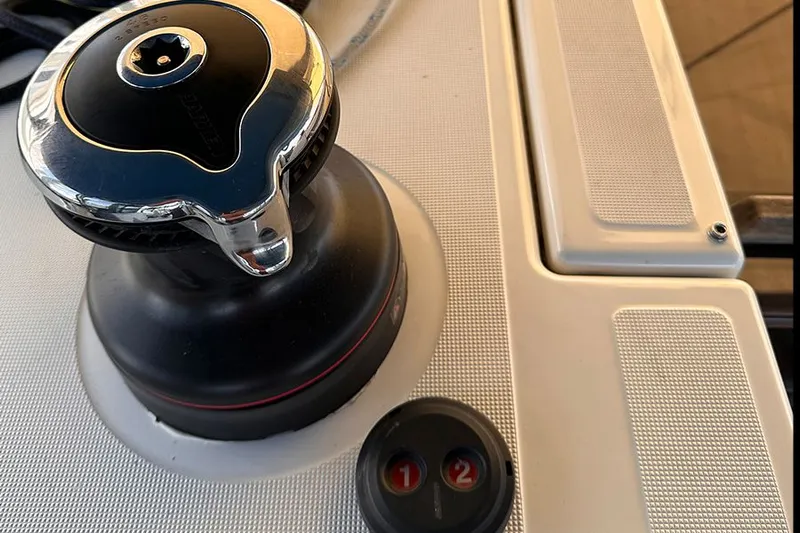 Nautical Dreamer Yacht Photos Pics Close-up of a winch and control panel on a 2019 Jeanneau Sun Odyssey 490 yacht.