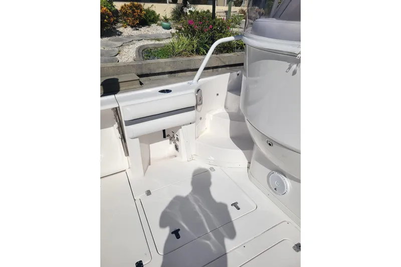 Previous Freshwater !! Yacht Photos Pics 2016 Intrepid 475 Sport Yacht deck area with seating and storage compartments.