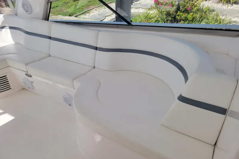 Previous Freshwater !! Yacht Photos Pics Luxurious seating area on 2016 Intrepid 475 Sport Yacht with white and gray upholstery.